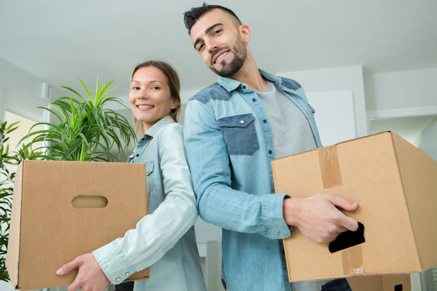 Couple moving home after obtaining their bridging loan in Perth