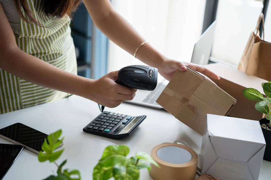 Business owner scanning stock